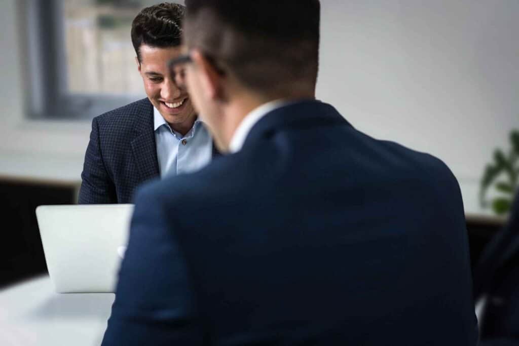Dan and Matt discussing work in the Chrome Telecom office, supporting security