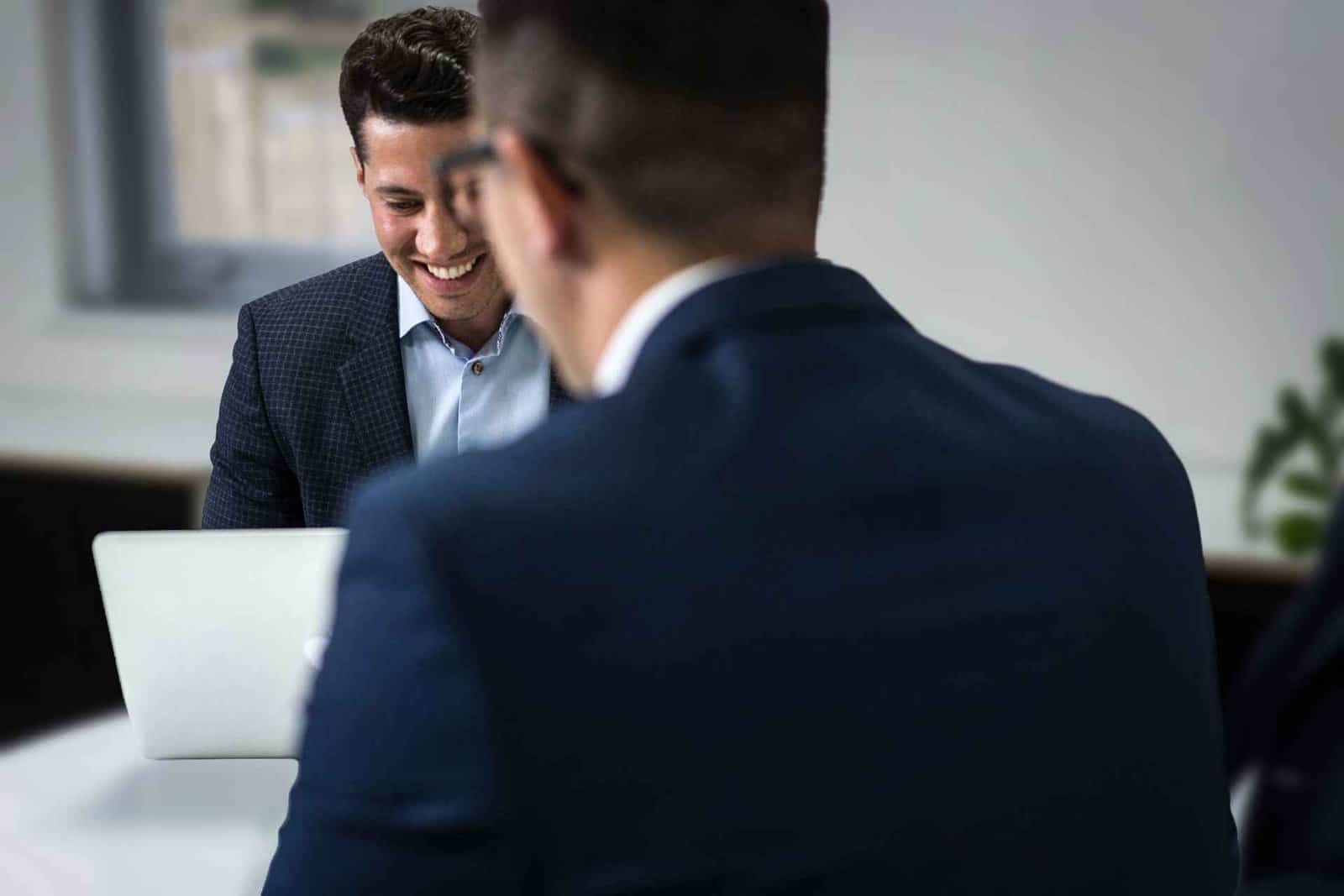 Dan and Matt discussing work in the Chrome Telecom office