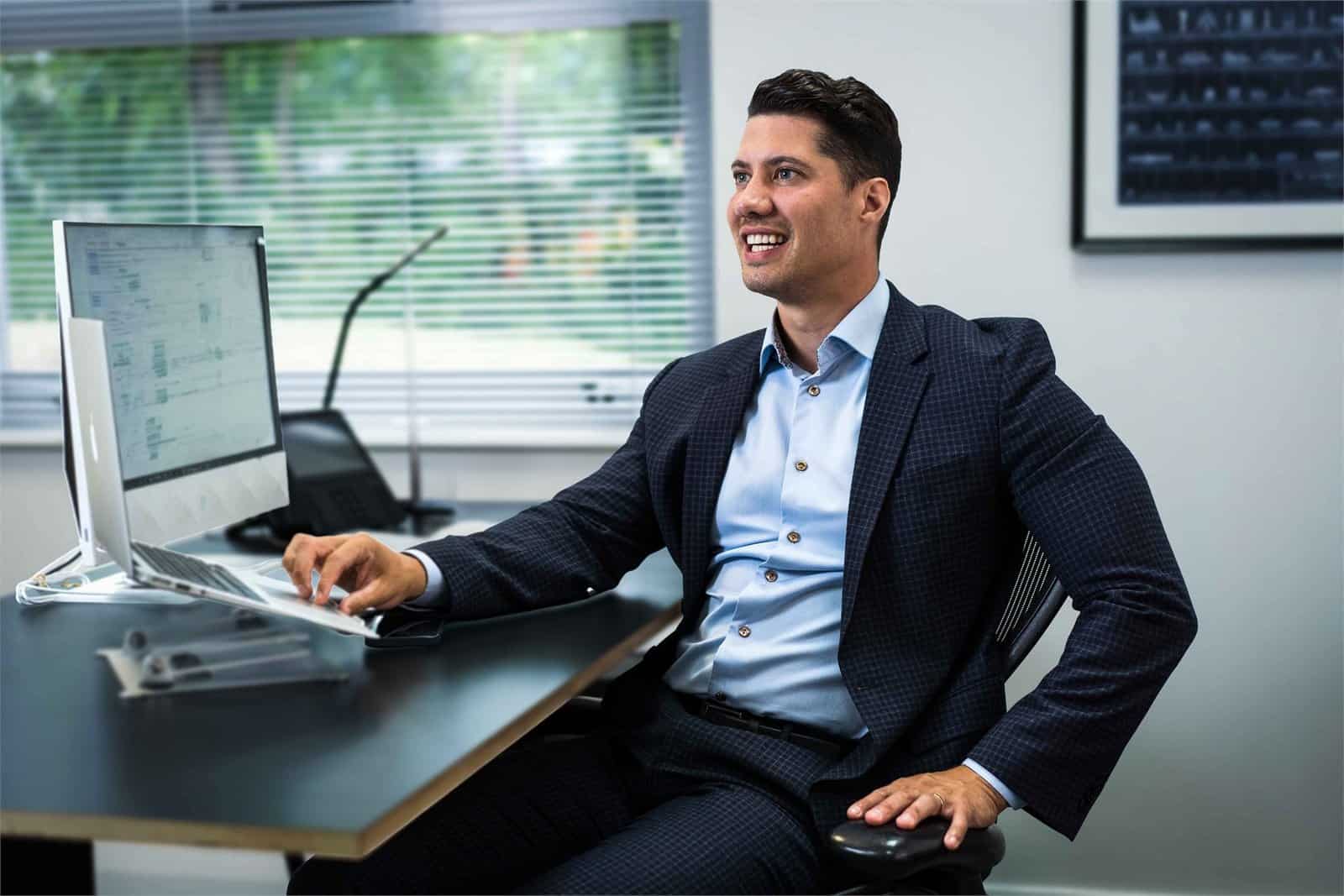 Dan working at his desk in the Chrome Telecom office, supporting CCTV