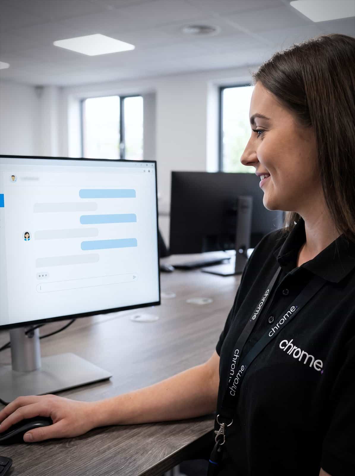 A Chrome Telecom colleague watches an AI chat assistant handle a customer conversation on screen
