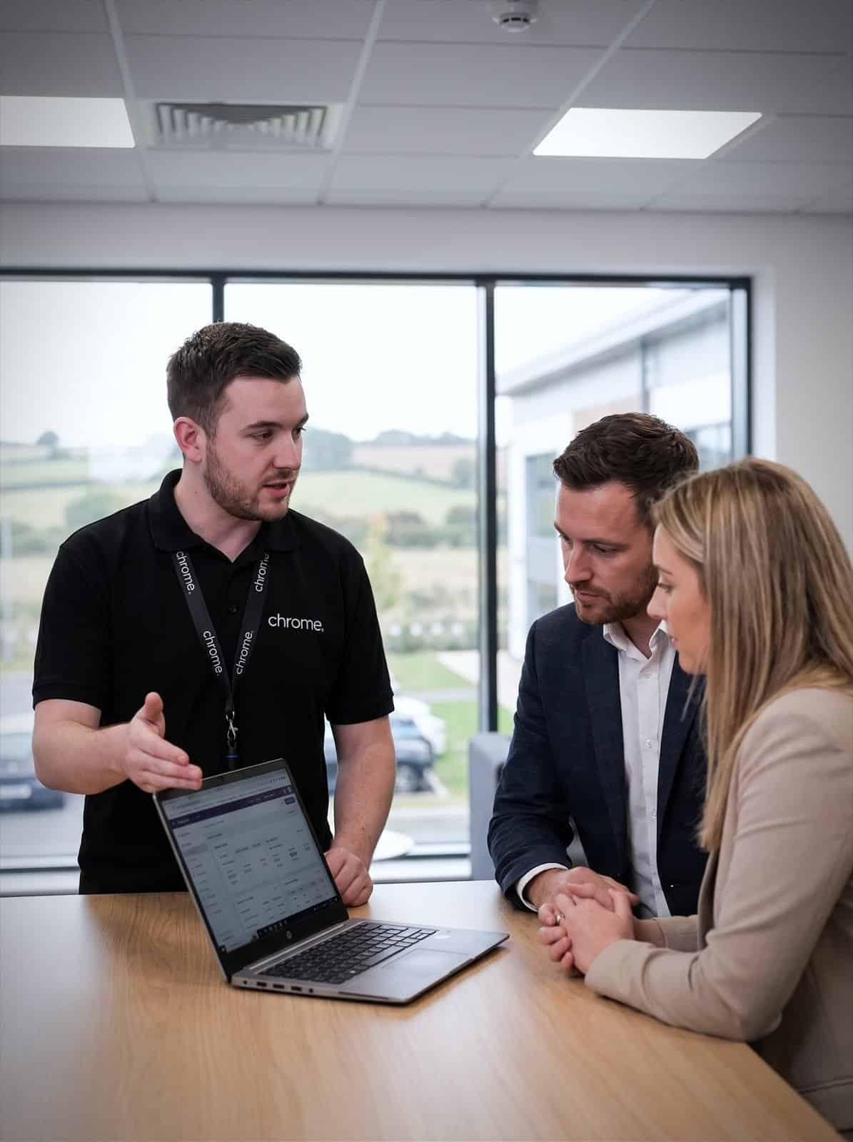 A Chrome Telecom account manager meeting customers at an office in Hampshire