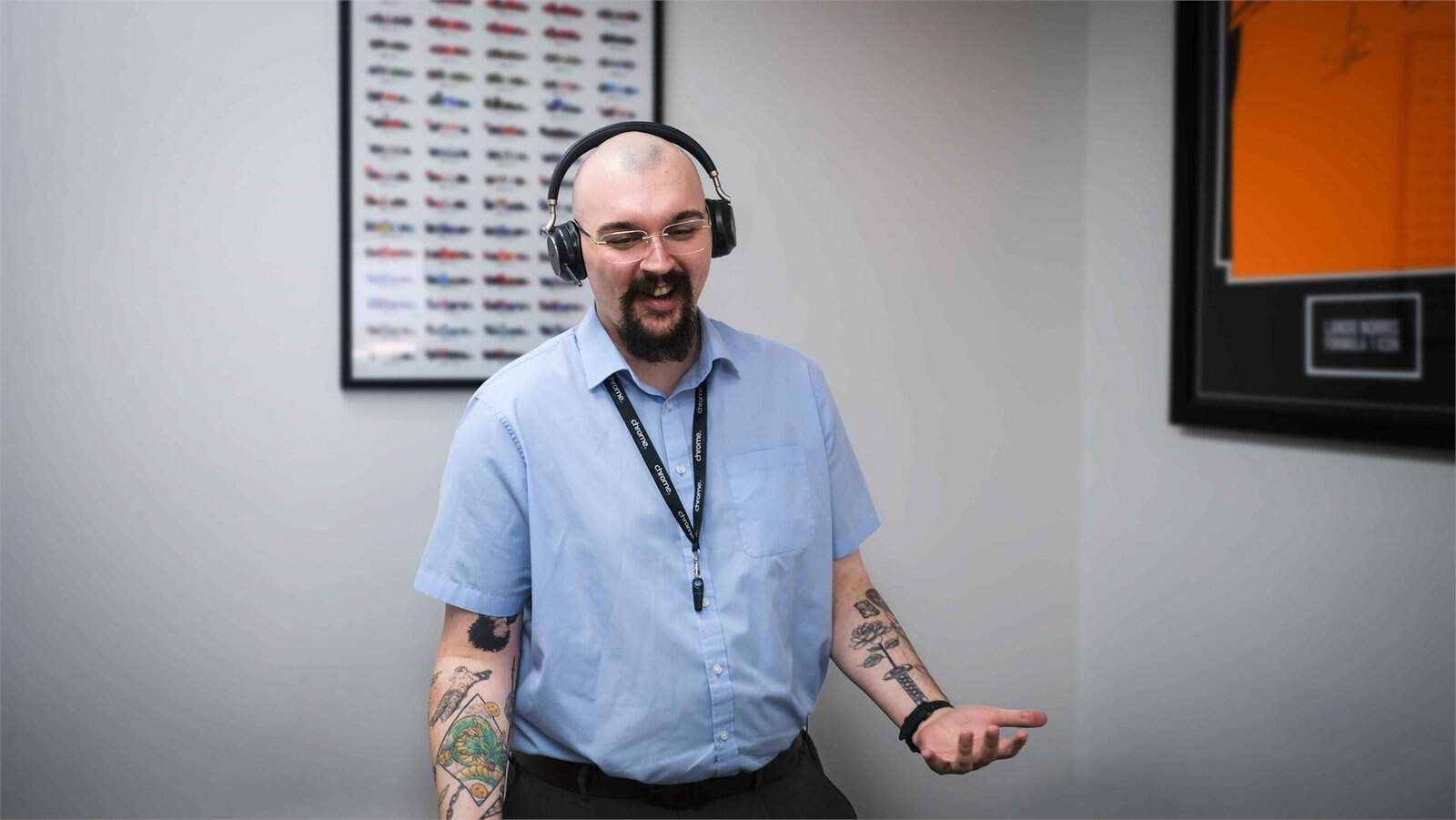 Jake taking a customer call on a headset, supporting business phone systems