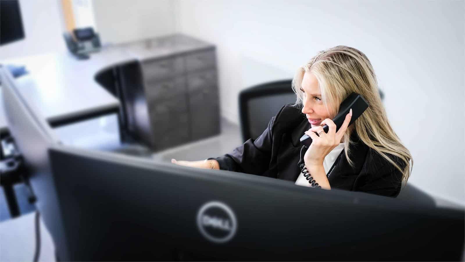 Sarah taking a customer call, supporting business communications in Southampton