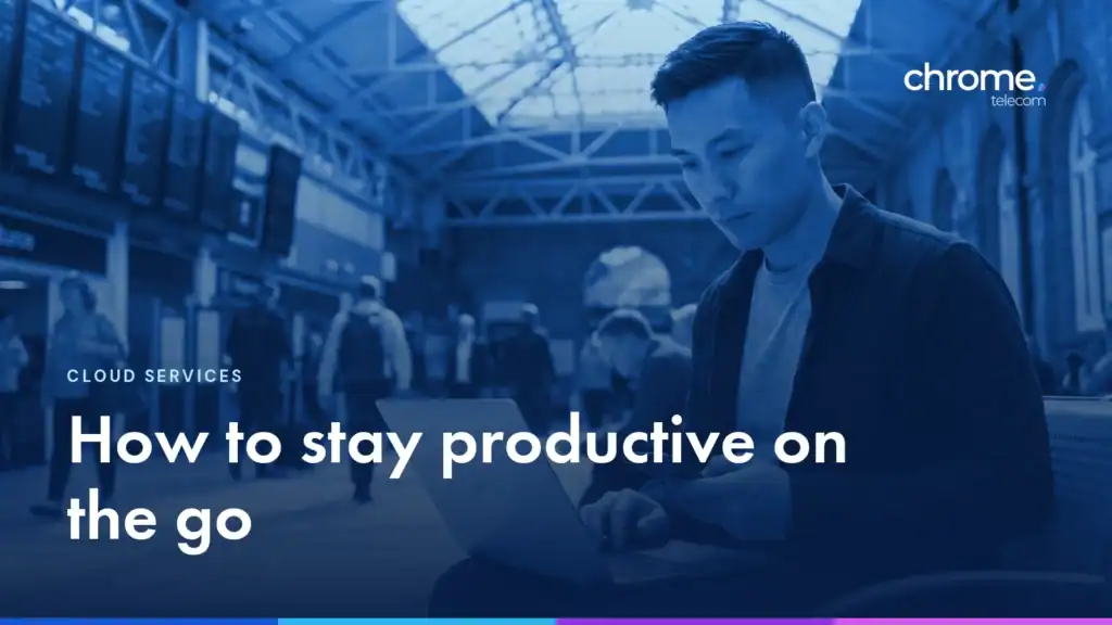 A commuter working on a laptop in a railway station concourse, with the headline How to stay productive on the go